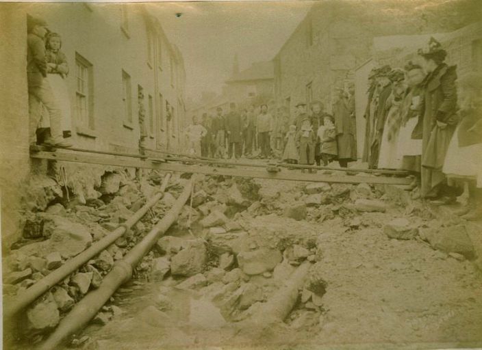 Gas and water mains exposed in St Ives following the floods in November 1894 (photo: courtesy of Morrab Library Photo Archive)
